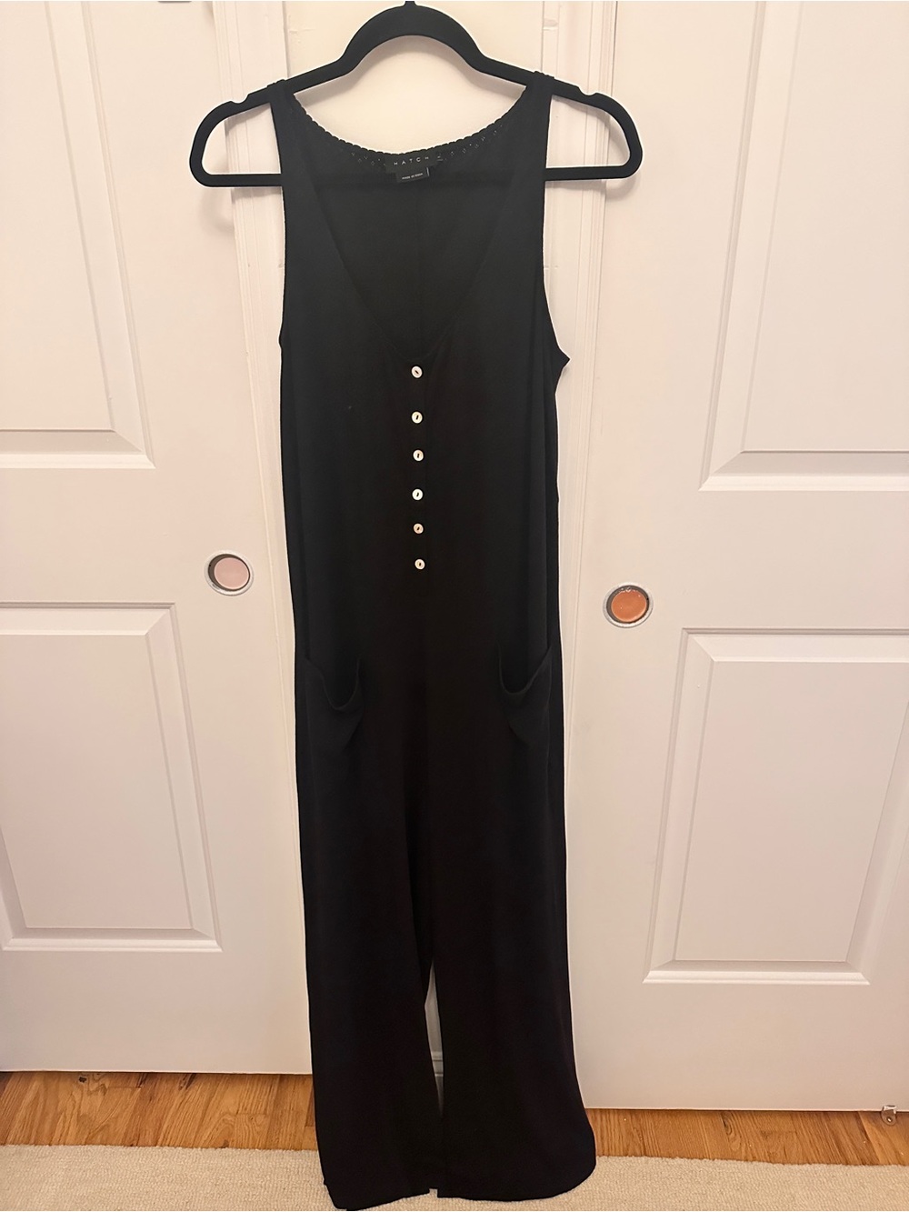 Hatch Black Sleeveless Button-Front Pointelle Jumpsuit